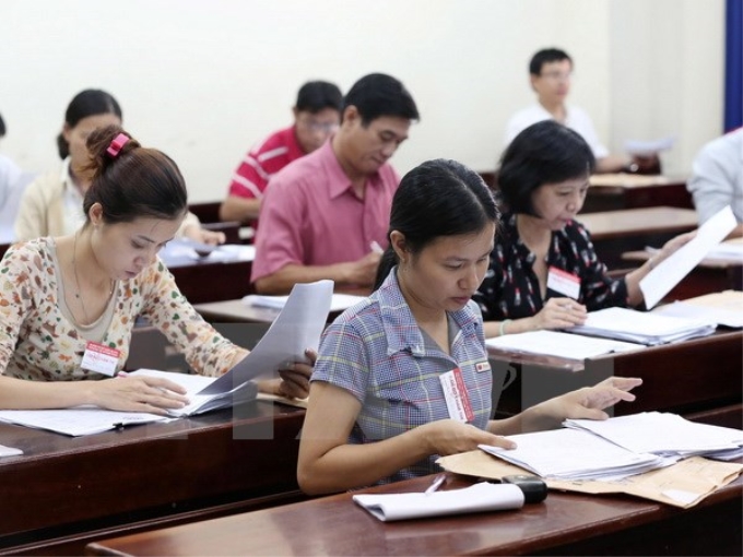 Các giáo viên chấm thi tại trường Đại học Sư Phạm TP. Hồ Chí Minh. (Ảnh: Phương Vy/TTXVN)